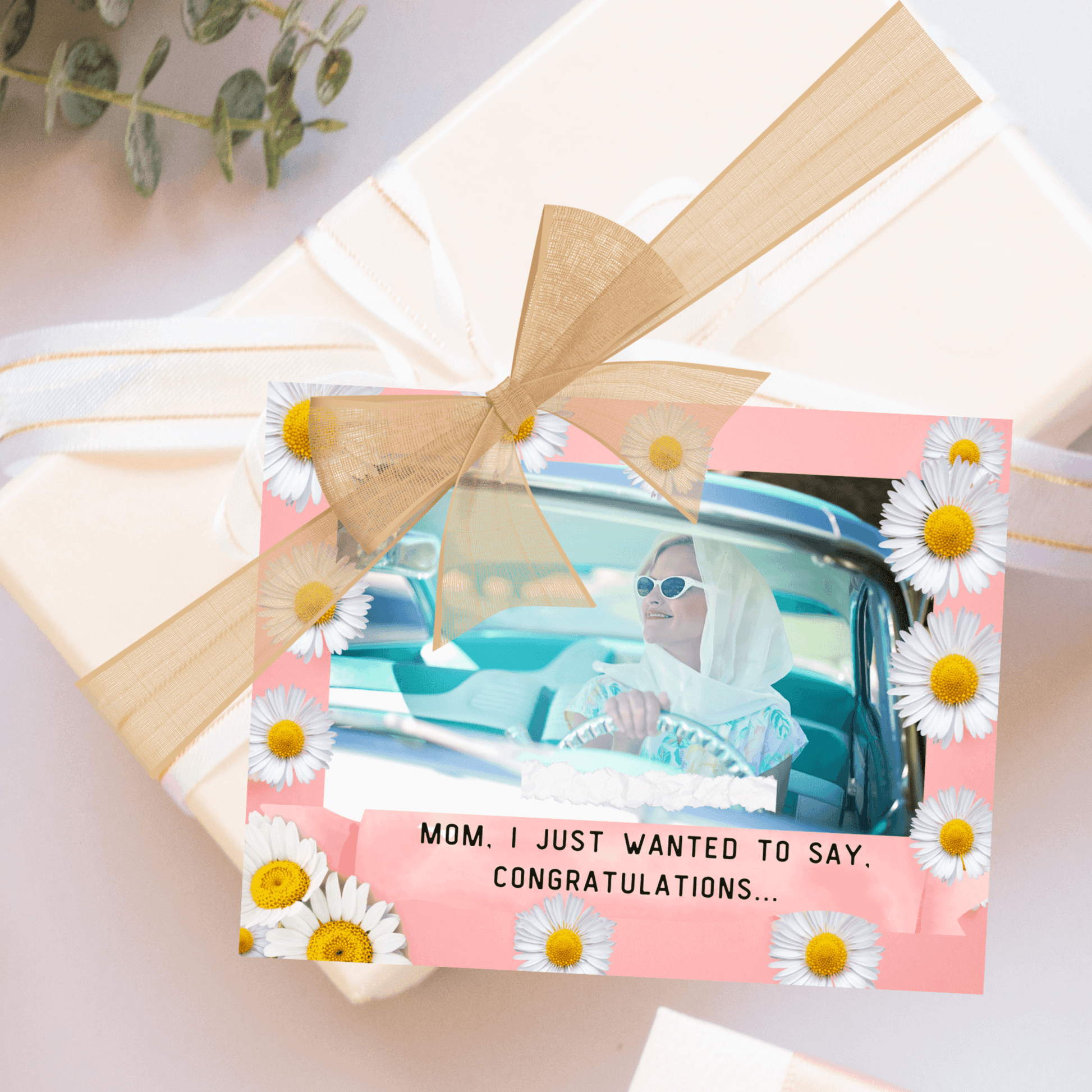 our funny mothers day card printable shown on a gift.