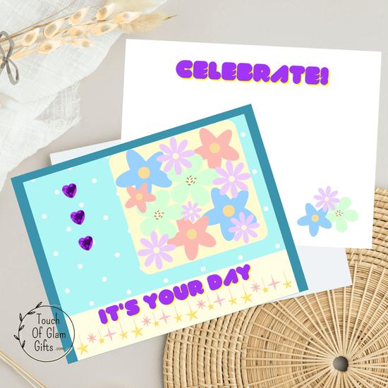 A colorful greeting card for her that says Its your day and has flowers and the inside says celebrate