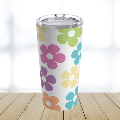 Our retro flowers tumbler cup is the perfect gift for her. This cute summer tumbler has colorful flowers on a white background.