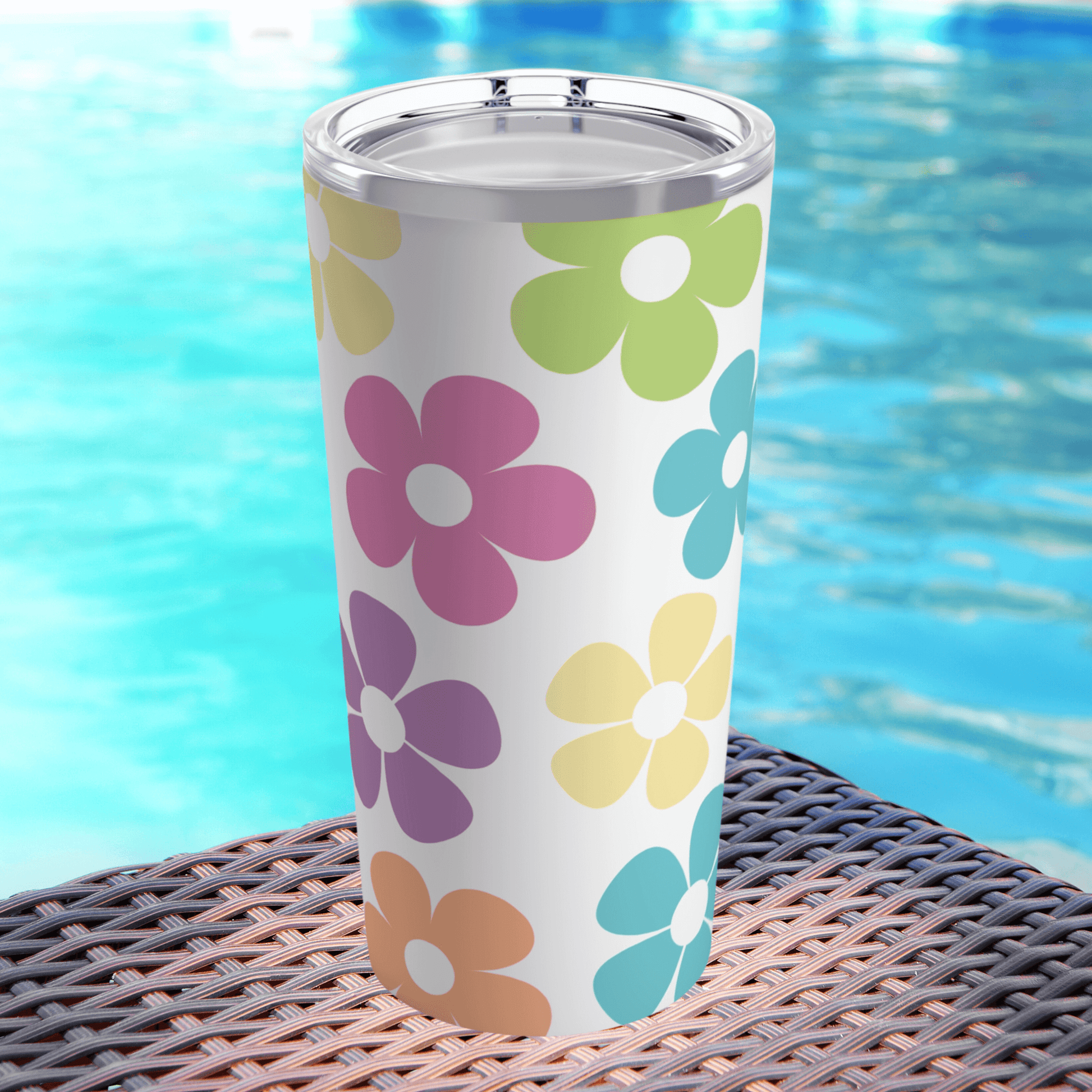OUr cute tumbler  holds twenty ounces and looks great next to a pool in summer.
