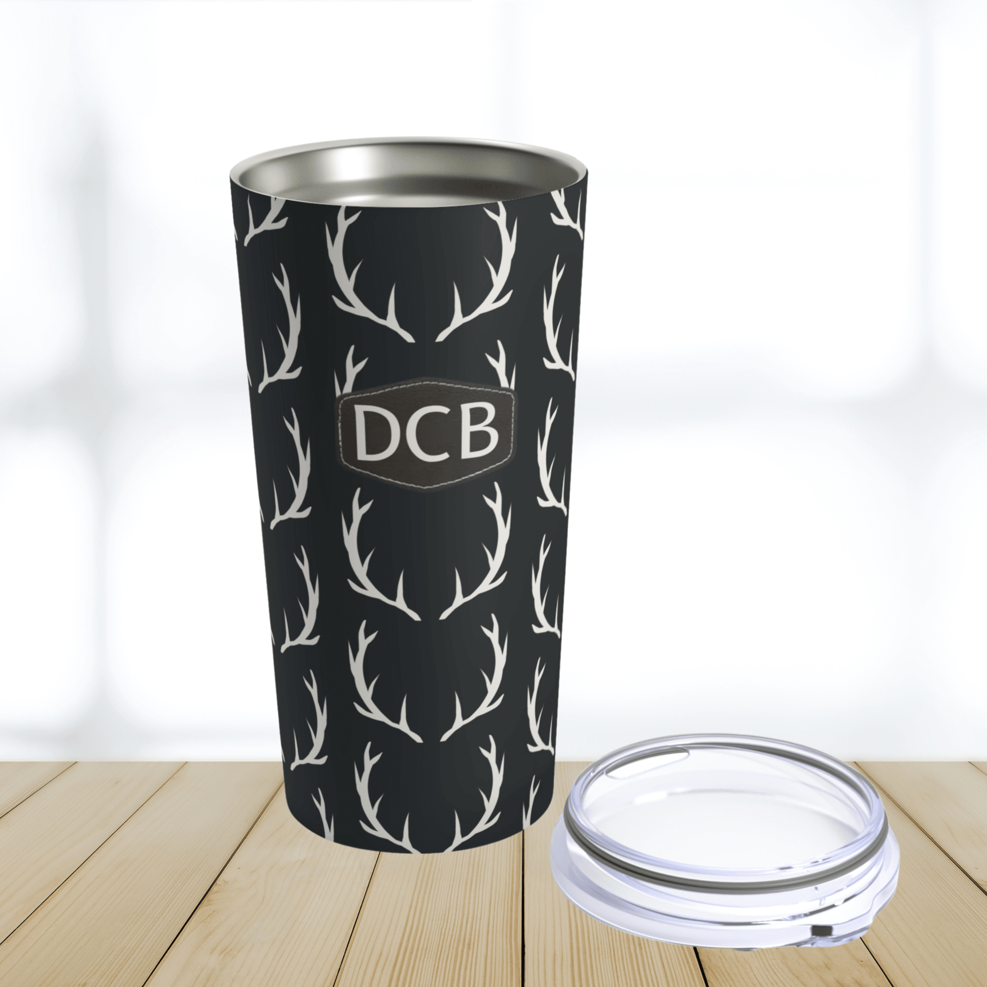 OUr deer antler tumbler cup is a durable stainless steel double wall insulated cup with a clear lid.