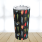 Our fishing lure tumbler cup has a black background and colorful fishing lures in greens blues reds and silver colors.