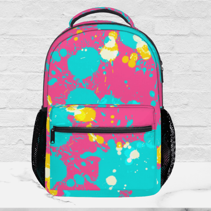Our kids backpack with paint splatter shown without the name.
