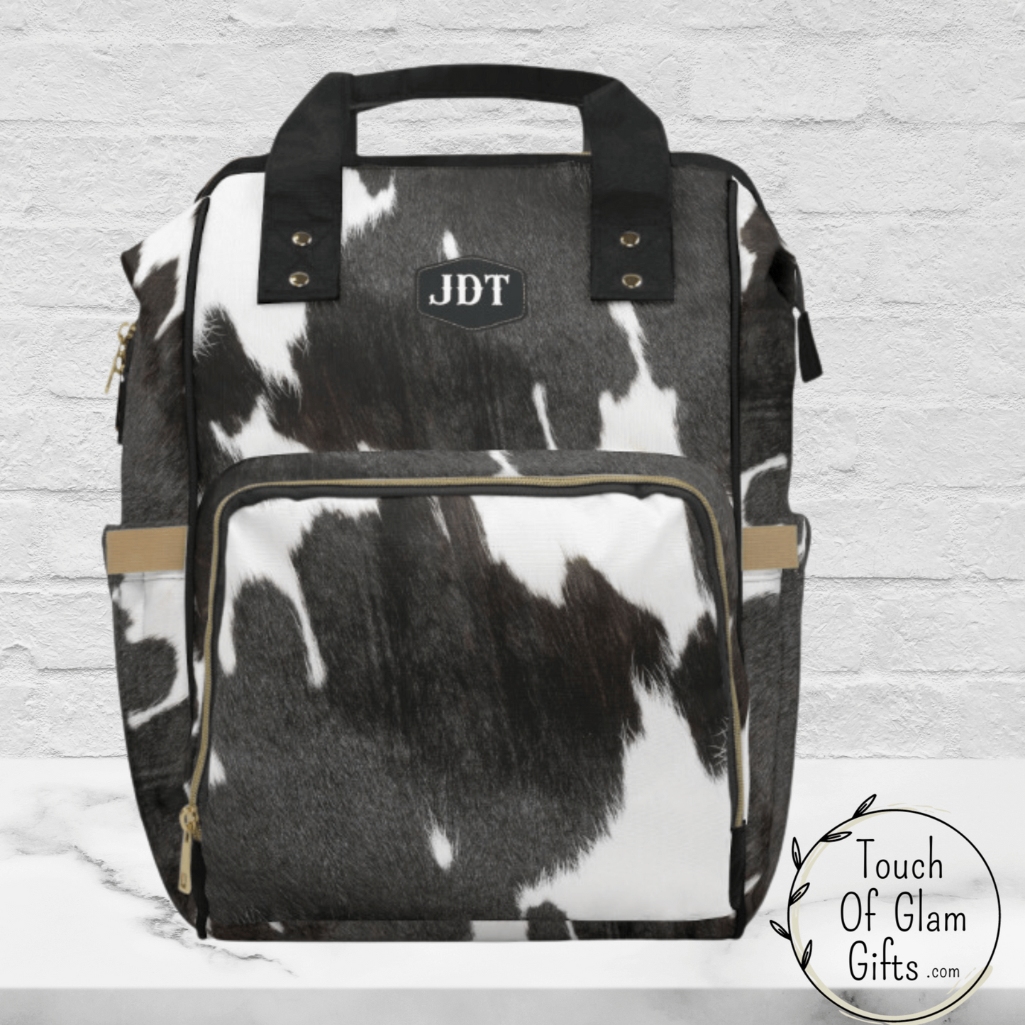 Our cow print diaper backpack makes a great personalized baby shower gift because you can add monogram initials for the western baby shower gift.
