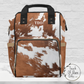 Our cowhide backpack can double as a purse or diaper bag backpack. The shades of rust color and white cow print looks real but its a print on nylon backpack and monogrammed with your initials.