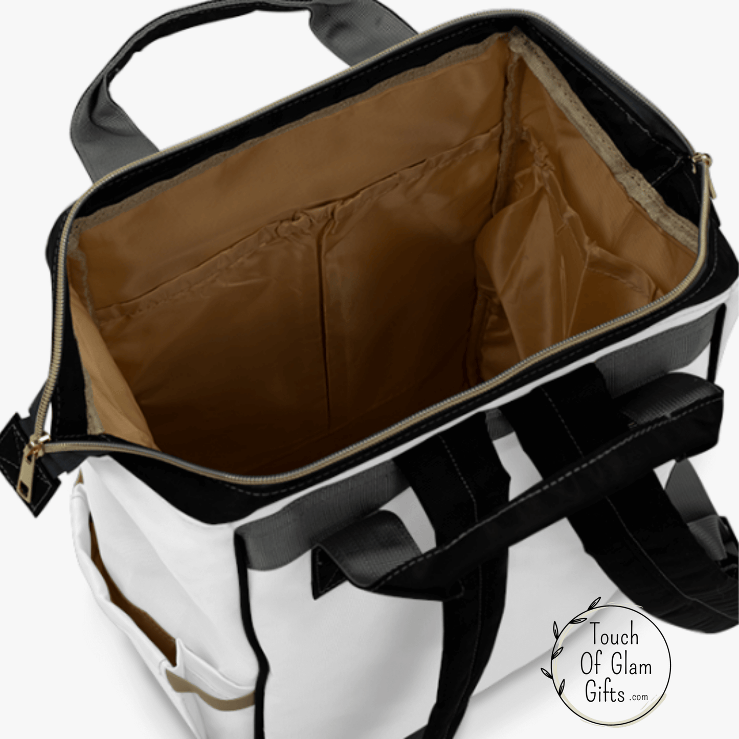 The inside of all of our diaper bags is nice and large and will fit a lap top and has many storage pockets for separating your stuff. The bag stands up on its own and the zipper covers the main compartment.