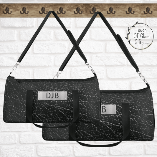 Mens dark grey and black leather print on canvas duffel bag is the perfect weekend bag for men. Available in small and large size duffel bag with monogrammed initials.