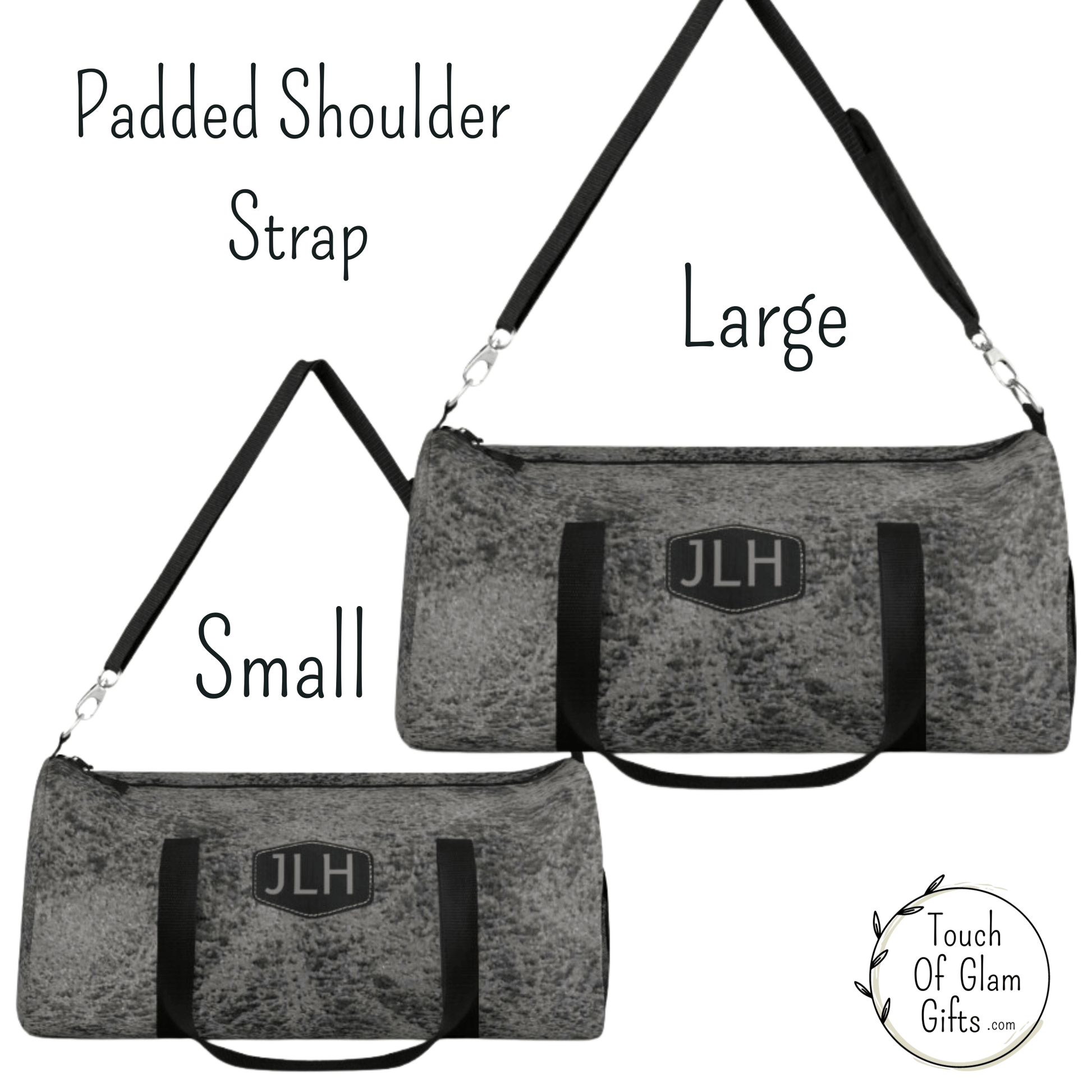A close up view of the large and small duffel bag in grey shows the quality built bags and the metal hardware and the padded shoulder strap.