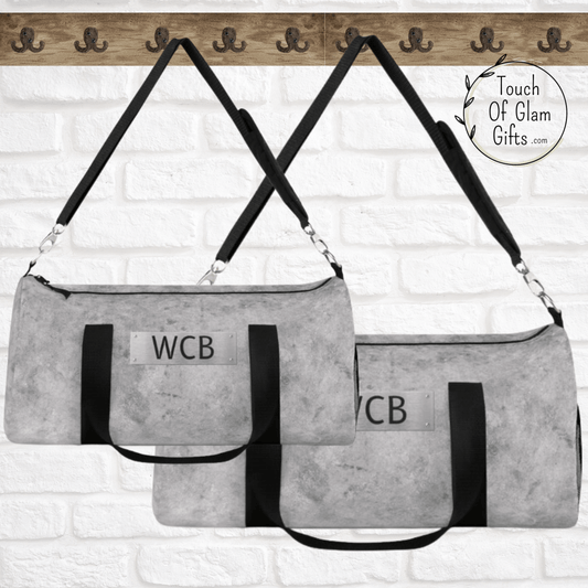 Our mens light grey duffel bag that looks like grey leather but is a canvas bag. Great for weekend bag for guys.