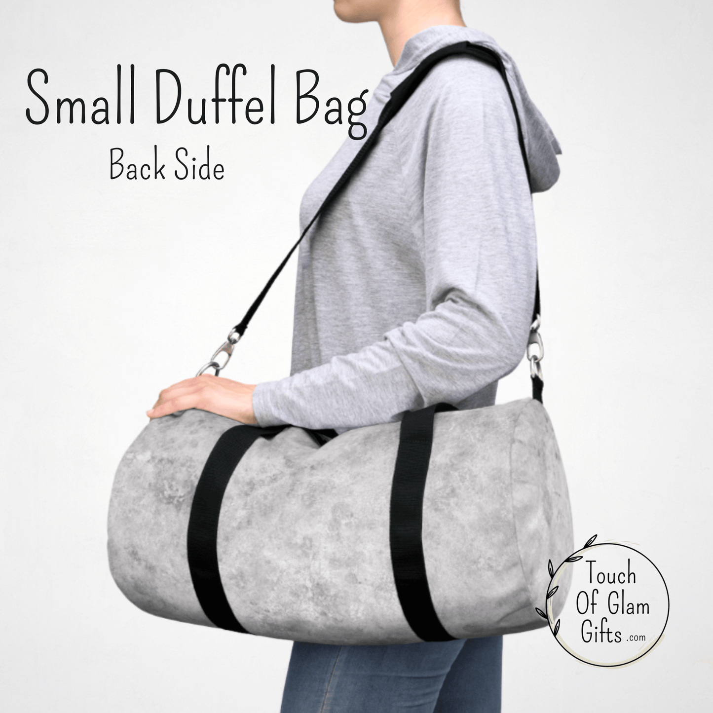 This light grey monogrammed duffel bag is perfect for women too.  A classy weekend bag thats personalized with your initials.