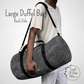 Our large duffel bag is shown on a male model to show the large size. 