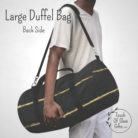 Our large duffel bag for men and women is shown on a male model to show the size of the canvas weekend bag. Men love duffel bags with a padded shoulder strap for traveling.