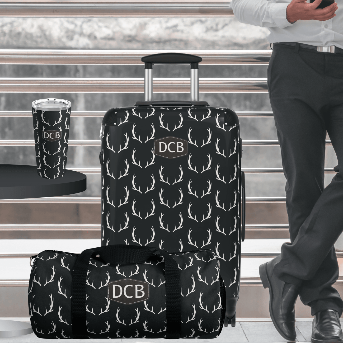 Our deer antler travel gear for men shows a monogrammed suitcase, tumbler cup and weekender bag for men with monogramming and the same deer antler design. This makes the perfect gift for deer hunters and outdoorsmen.