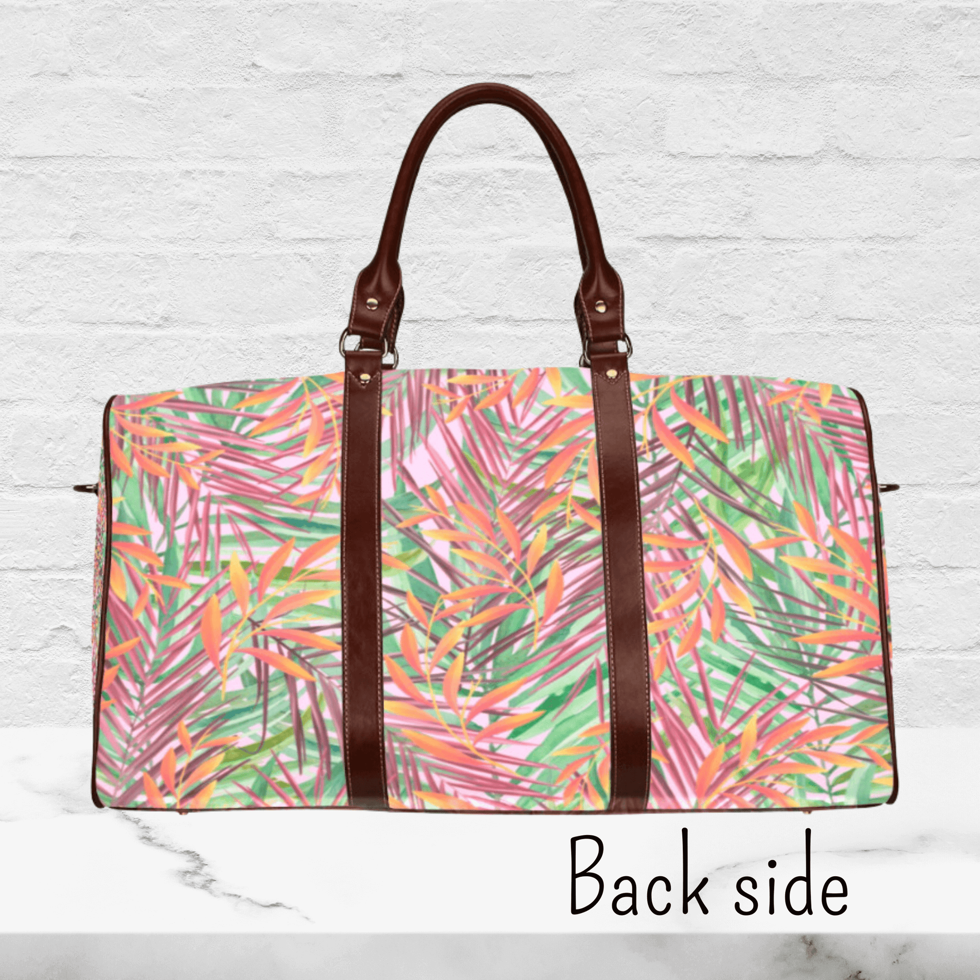 The back side of our weekender bag has the same tropical print.