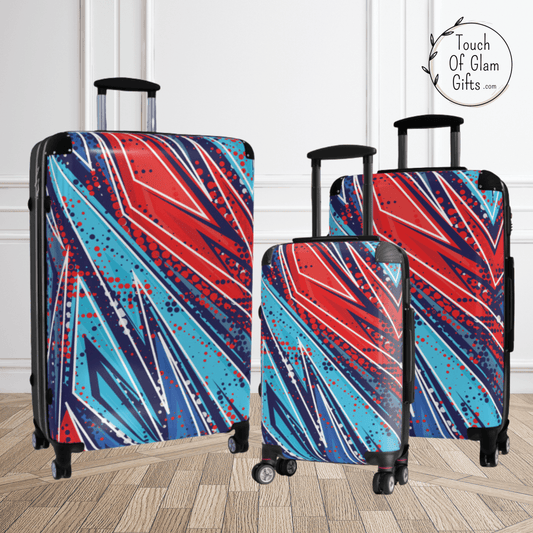 OUr luggage for teens and young adults features this triangle design of reds and blues and the suitcases some in three sizes. Quality luggage with spinner wheels and adjustable handles and designed for fun young adults.