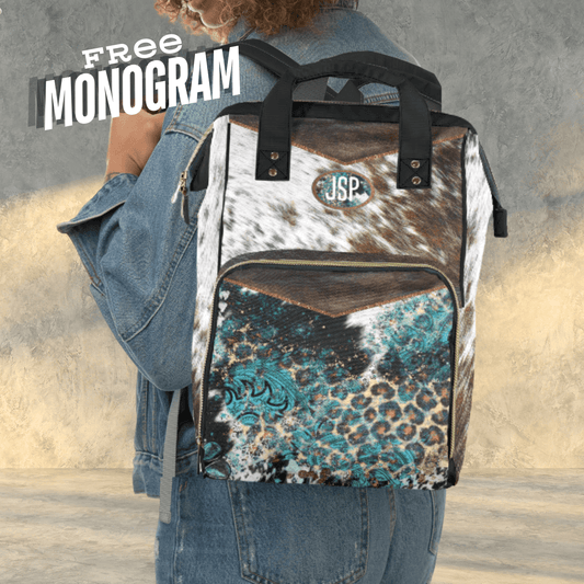 Western cowhide and turquoise backpack is the perfect travel bag for women