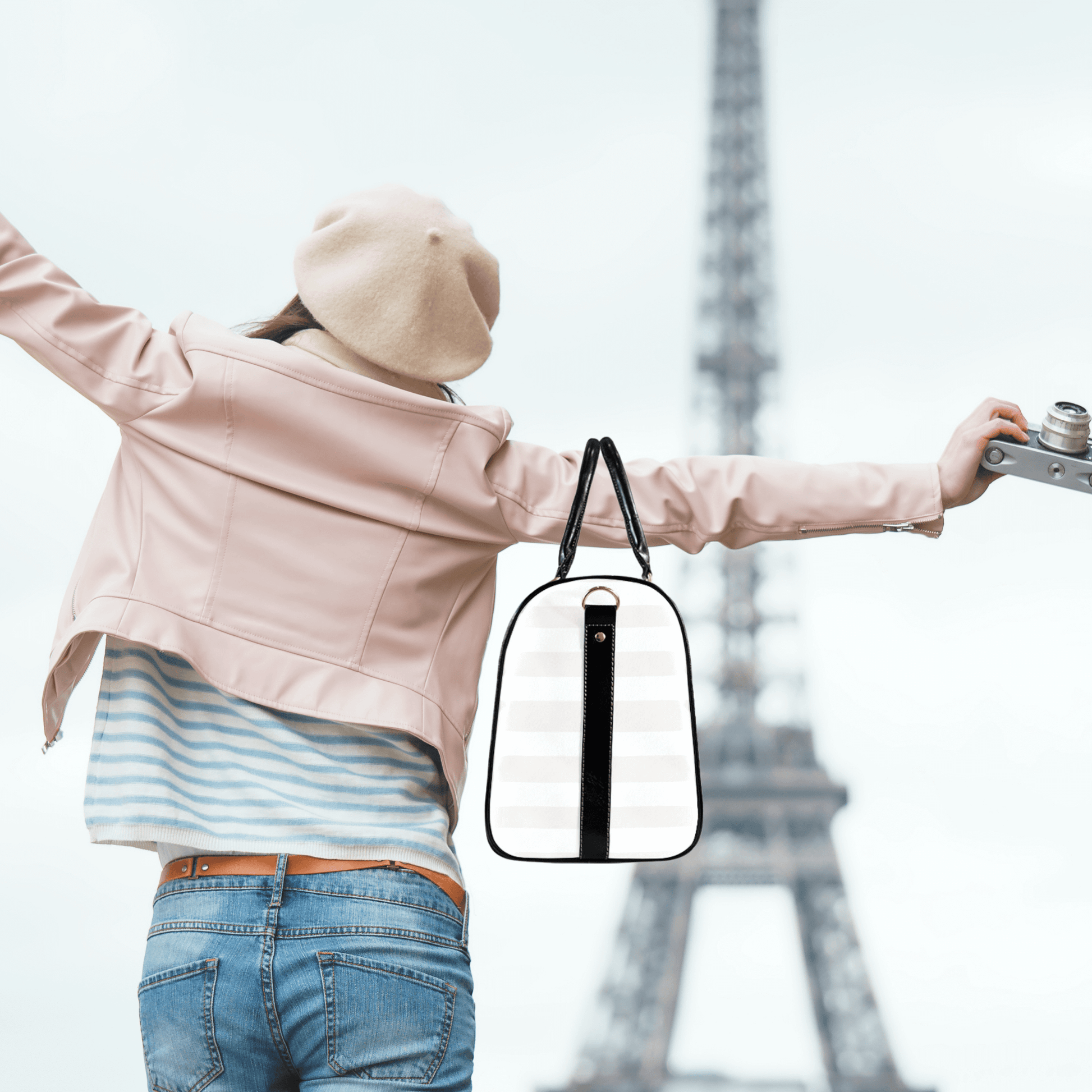 Our model is in Paris with her elegant weekender bag.