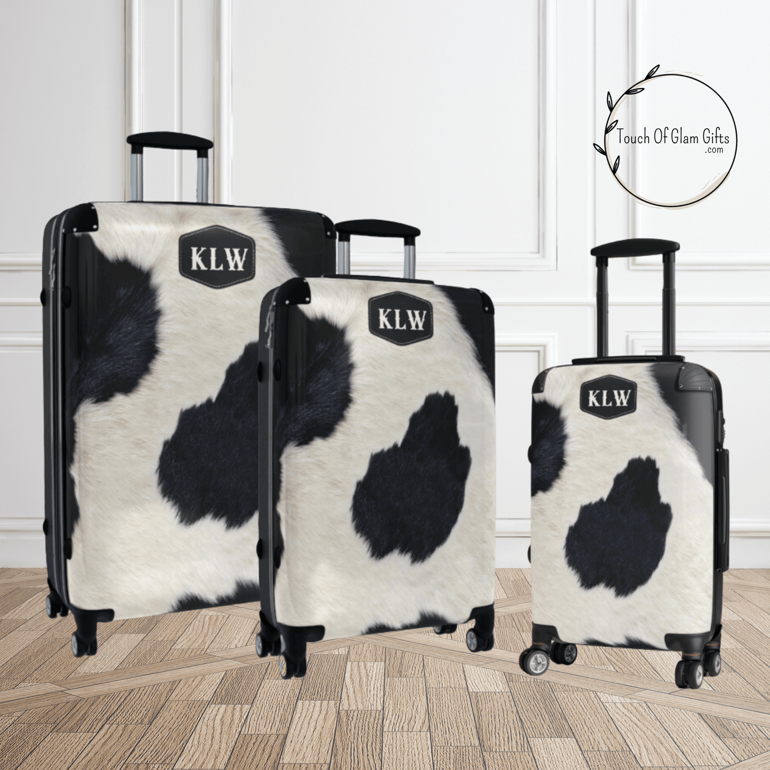 Our black and white cowhide luggage set. Personalized western luggage for the cowgirl.