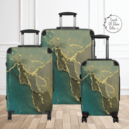 this turquoise marble print on canvas covered in a clear hard shell plastic luggage set will stand out from the crowd. Available in three sizes.