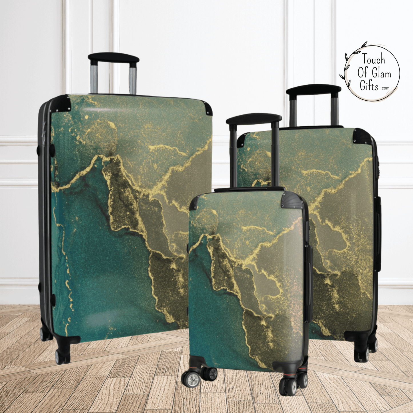 A large, medium and small carry on suitcase in a designer luggage marble look.