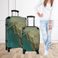 The medium and small suitcases next to a female model to show the size.